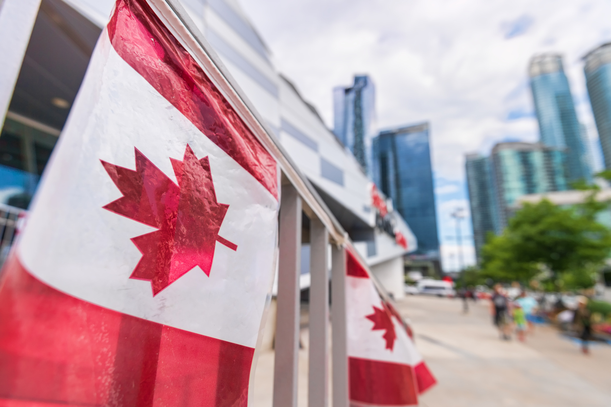 Canadian flags along a building in toronto
